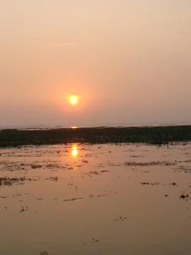 Sunset in River side with Reflection on water beautiful natural beauty Stock Photos