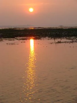 Sunset in River side with Reflection on water beautiful natural beauty Stock-Fotos