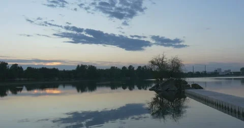 Sunset on The River, Silhouettes of Trees And Sky Reflection in Water Stock Footage 50854337