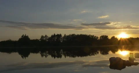 Sunset on The River, Silhouettes of Trees And Sky Reflection in Water Video stock 50857970