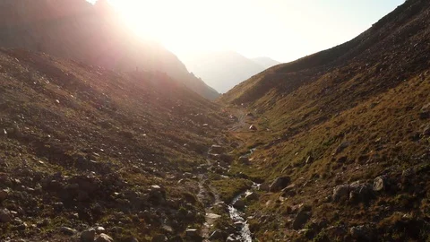 Sunset River Span Of The Drone Between Two Mountains Stock Footage 128363600