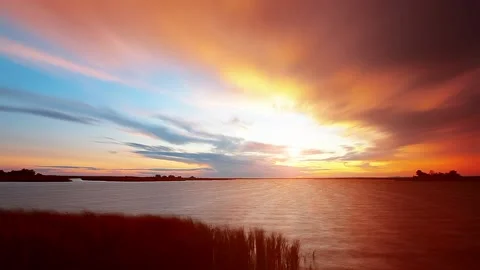 Sunset on the river timelapse Stock Footage 166456232