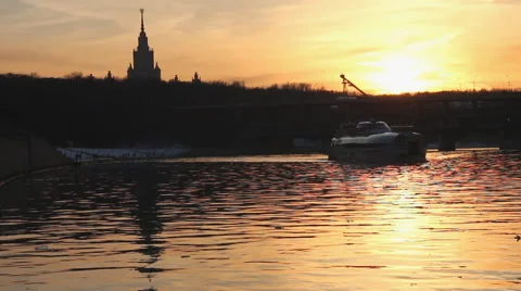 Sunset on the river in urban landscape Stock Footage 61218876