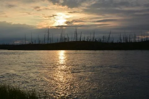 Sunset on the river in vicinity of Norilsk. Stock Photos