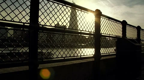 Sunset River View (boats and fence silhouette) Stock Footage 8686693