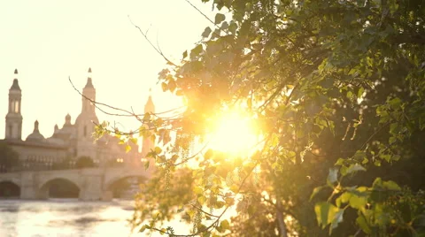 Sunset On the River In Zaragoza With Our Lady of the Pillar Basilica On The Stock Footage 65181087