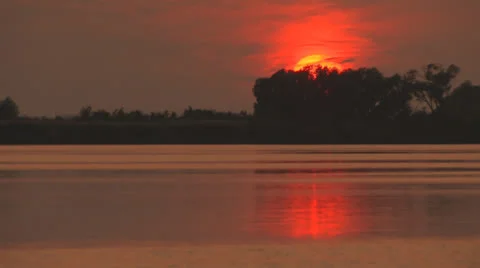 Sunset on river zoom out Stock Footage 26131427