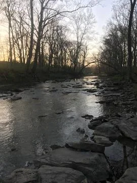 Sunset on a Riverbed Stock Photos