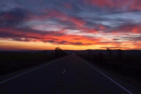 Sunset Road  with car 스톡 사진