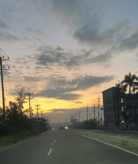 Sunset on the road. Car point of view driving on the road at sunset. Stock Footage 320264667