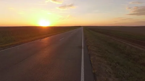 Sunset Road Flight over the road Very low Stock Footage 68863151
