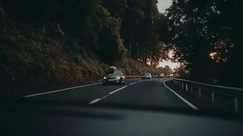 Sunset on the road Stockbeeldmateriaal 76360346