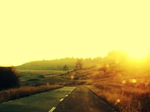 Sunset on the road Stock Photos