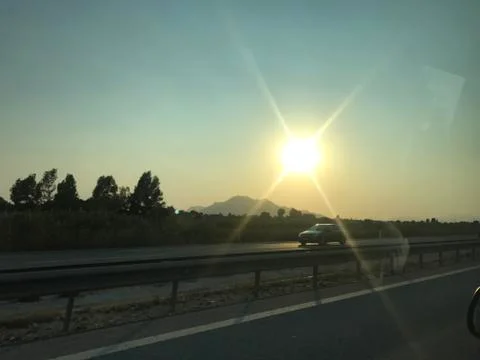 Sunset on the road Stock Photos