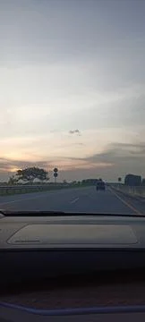 Sunset on the road Stock-Fotos