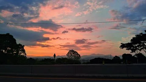 Sunset on the road Stock Photos