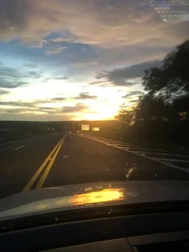 Sunset on the road Fotos de archivo