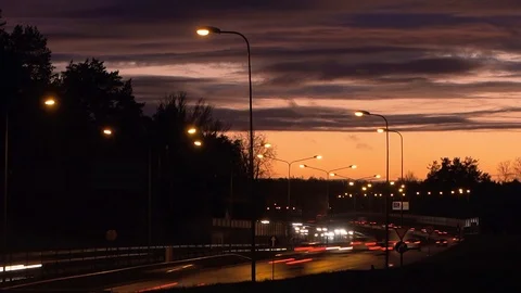 Sunset road traffic time lapse Stock Footage 120580715