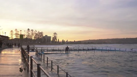 Sunset at a rockpool near the ocean in Dee Why beach Australia. Stockbeeldmateriaal 141014463