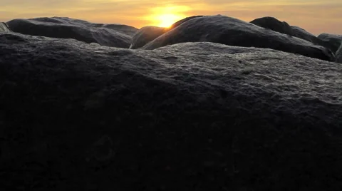 Sunset on the rocks. Video stock 63363416