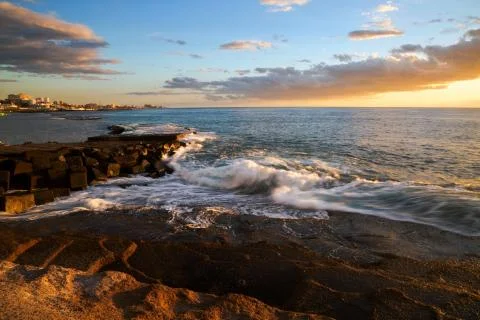 Sunset at rocks Stock Photos