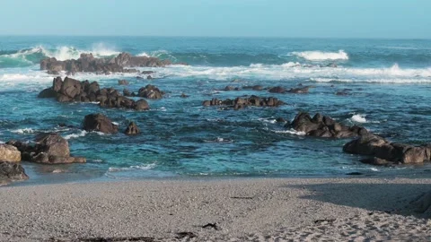 Sunset at Rocky Beach during Low Tide Stock Footage 186757494