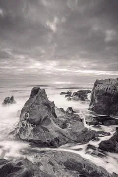 Sunset at the rocky beach at Vila Nova de Gaia, Portugal Stock Photos