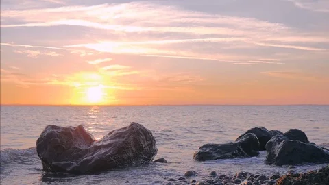 Sunset on rocky shore Stock Footage 102173181