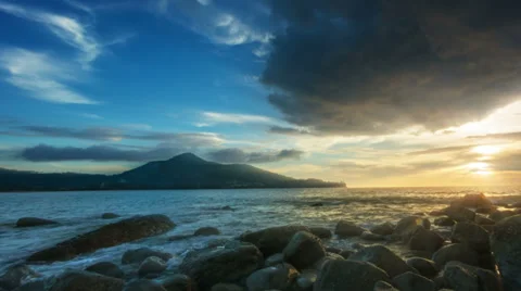 Sunset at rocky shore of the ocean with surf sound. thailand, phuket Stock Footage 32348997