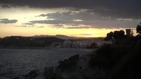 Sunset on the Ronda de Lloret de Mar path Stock Footage 112595849