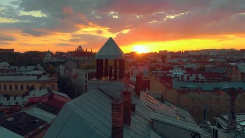 Sunset on roofs column chimney Stock Footage 118300862