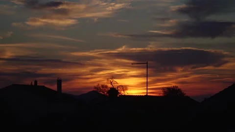 Sunset. roofs of houses. plane Stock Footage 301819613