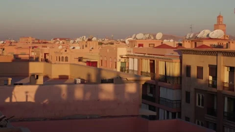 Sunset Rooftop Panorama of Marrakech with Satellite Dishes and Mosque Video stock 300541872