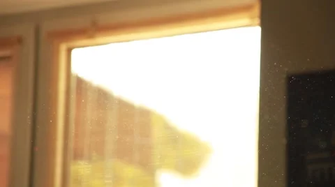 Sunset in room full of light dust particles Stock Footage 49326646