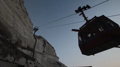 Sunset at Rosh Hanikra grottoes - Cable car going down Stock Footage 34258014