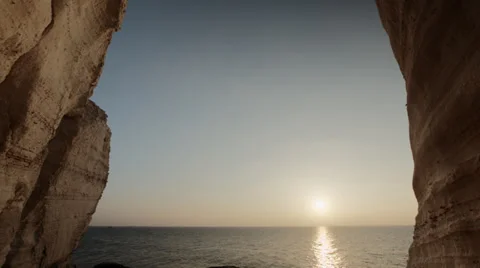 Sunset at Rosh Hanikra grottoes - looking south from the bridge Stock Footage 34259054