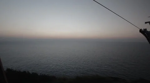 Sunset at Rosh Hanikra grottoes - looking out from the cable car Stock Footage 34259628