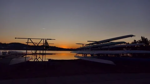 Sunset with row boats in foreground Video stock 279785805