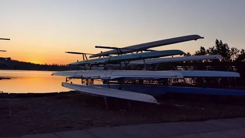 Sunset with row boats on stand Stock Footage 279785767