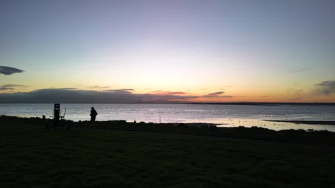 Sunset runner during a cold winters day in Dublin Stock Footage 260824652