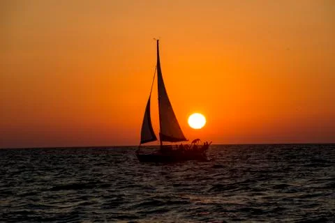 Sunset sail Stock Photos
