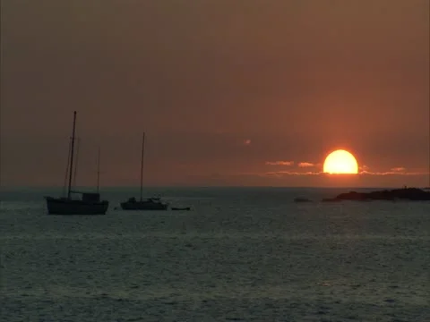 Sunset with Sailboat Stock-Footage 22243103