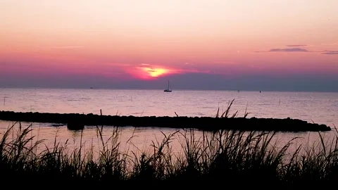 Sunset with Sailboat Stock Footage 135987212