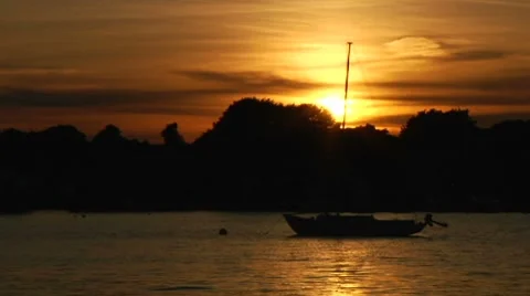 Sunset with Sailboat Silhouette Stock Footage 7728266