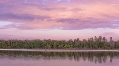 Sunset with sailing boat on the river  Stock Footage 12060087