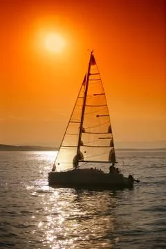 Sunset sailing Stock Photos