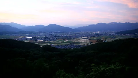 Sunset, Salt Fields, and the City of Ueda 스톡 동영상 330198648