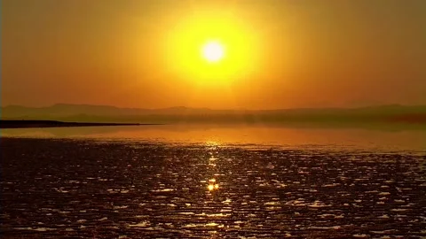 Sunset at the salt lake, the camera stands still. Stock Footage 135350644
