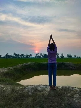 Sunset Salutation in a Tranquil Countryside Stock Photos