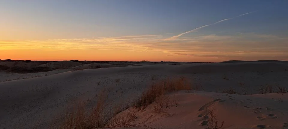 Sunset at sand dunes Фото